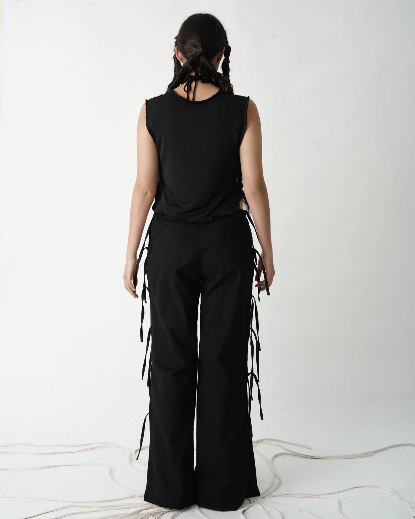 pantalón tiras, nudos y secretos